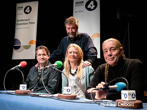Gardeners' Question Time at Chelsea Fringe 2013. Matthew Wilson, Bunny Guinness, Bob Flowerdew, with host Eric Robson standing.